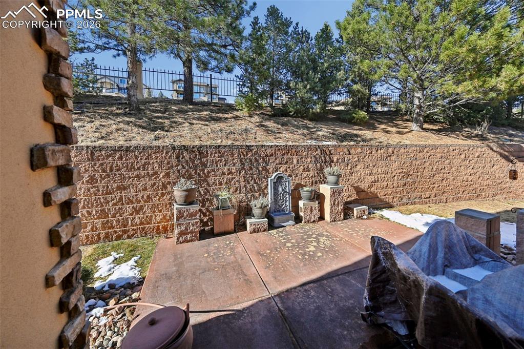 Image 32 of 45: Partially Covered Back Patio