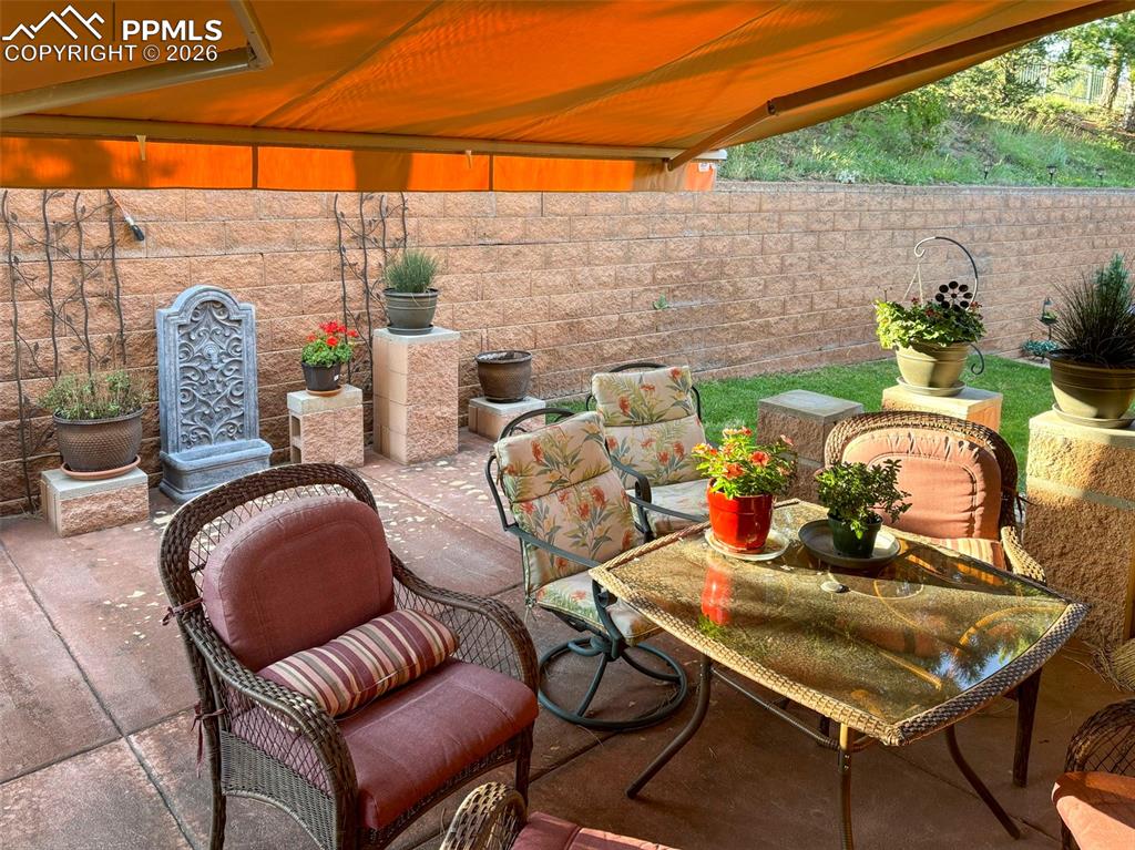 Image 33 of 45: Relaxing Partially Covered Patio