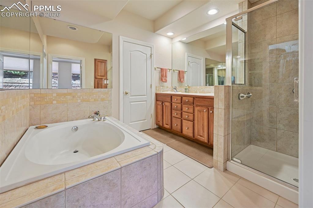 Image 9 of 45: Primary Bathroom with Soaking Tub