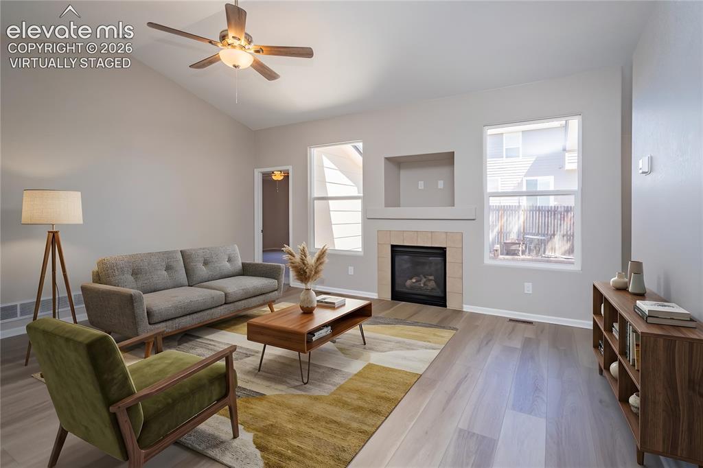 Image 13 of 39: Virtually Staged Living Room - plenty of room to relax or entertain!