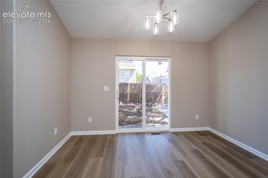 Image 15 of 39: Plenty of space for gathering around the table with family & friends!