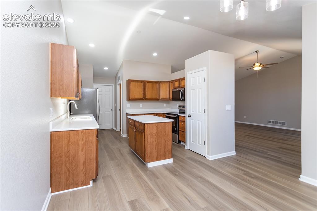 Image 17 of 39: The convenient Dining & Kitchen & Living Room. Great for entertaining!