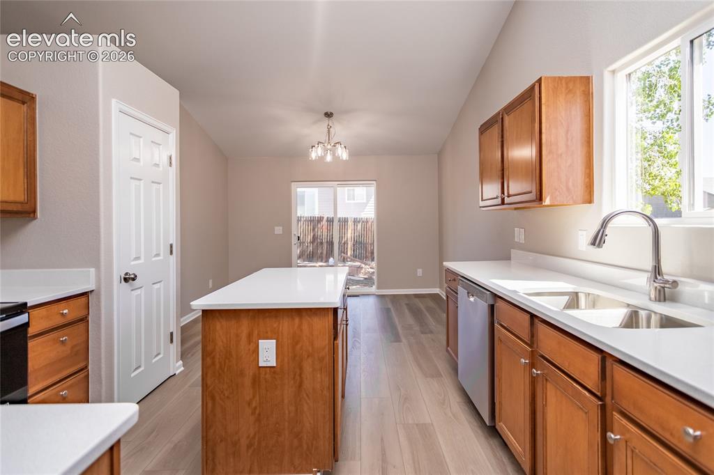Image 20 of 38: Easy flow in the kitchen - room for many cooks!