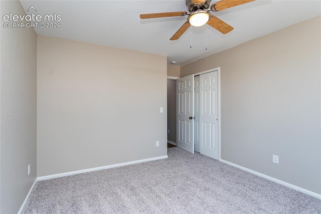 Image 25 of 39: This secondary bedroom is comfy & cozy!
