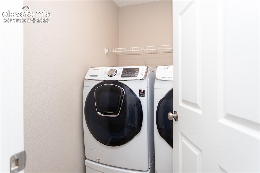 Image 30 of 39: Stylish washer & dryer stay with the home!