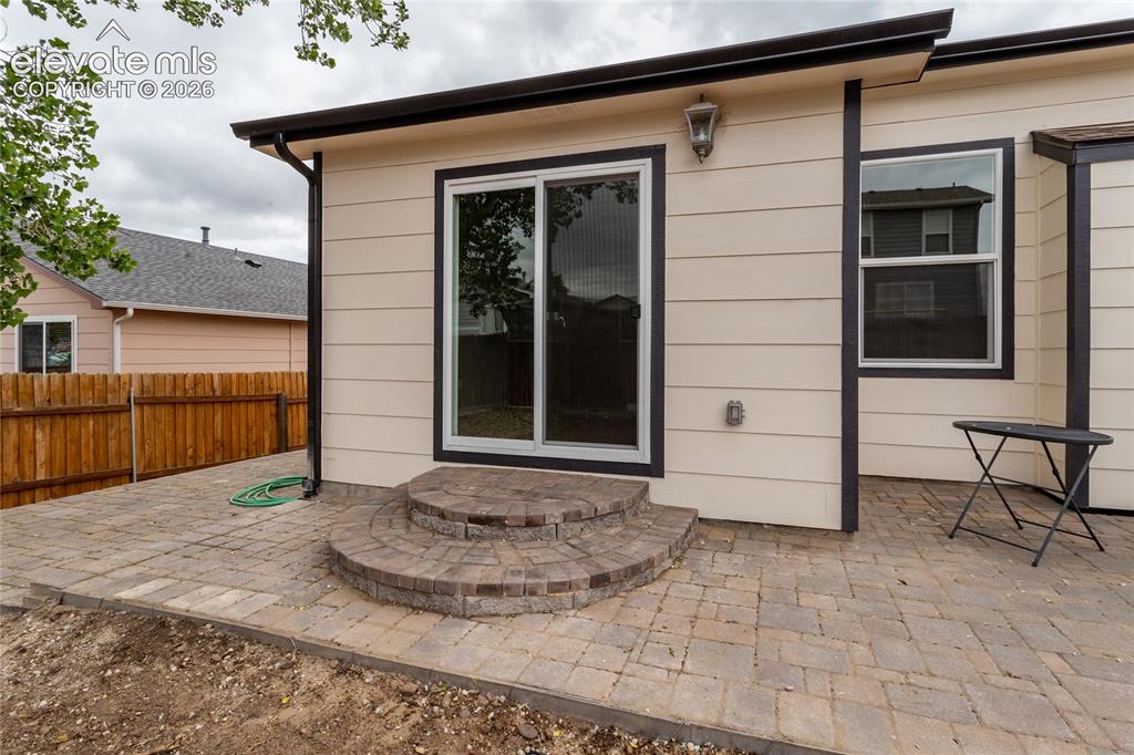 Image 31 of 39: Beautiful new brick pavers - enjoy your morning coffee!