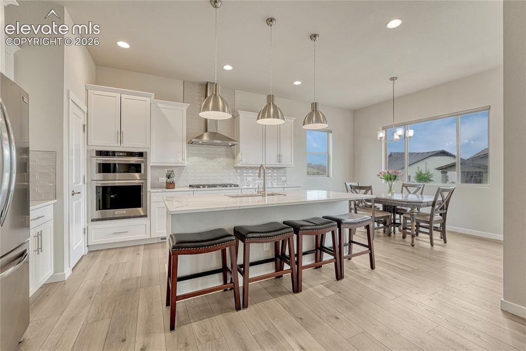Image 11 of 41: Generous kitchen with large island...