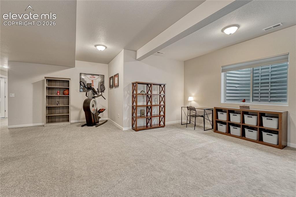 Image 31 of 41: ...work-out space to homework to craft or hobby space.