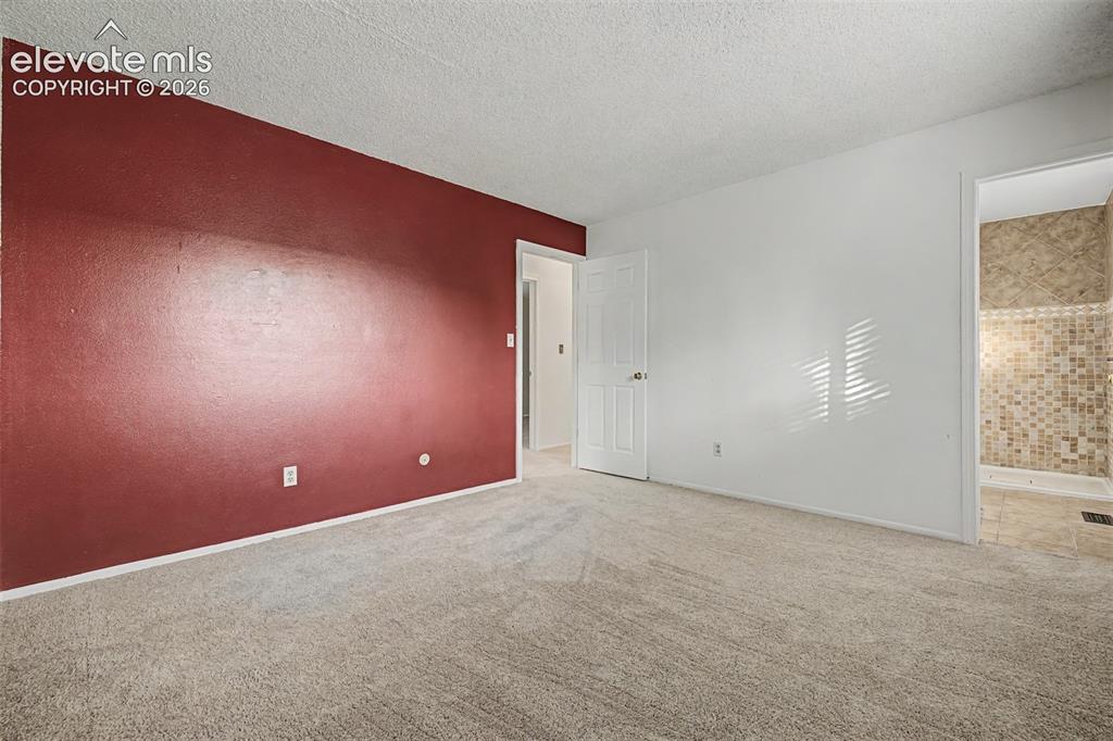Image 12 of 40: Master Bedroom