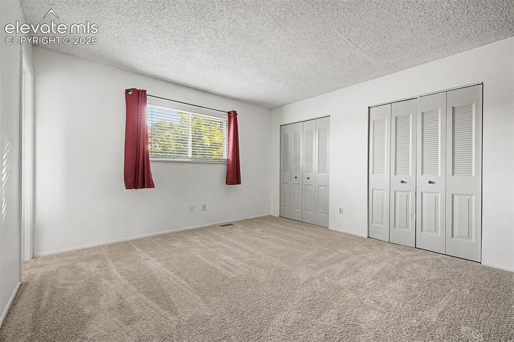Image 13 of 40: Master Bedroom