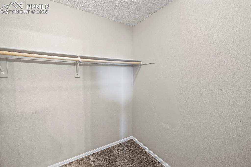 Image 20 of 34: Primary Walk In Closet