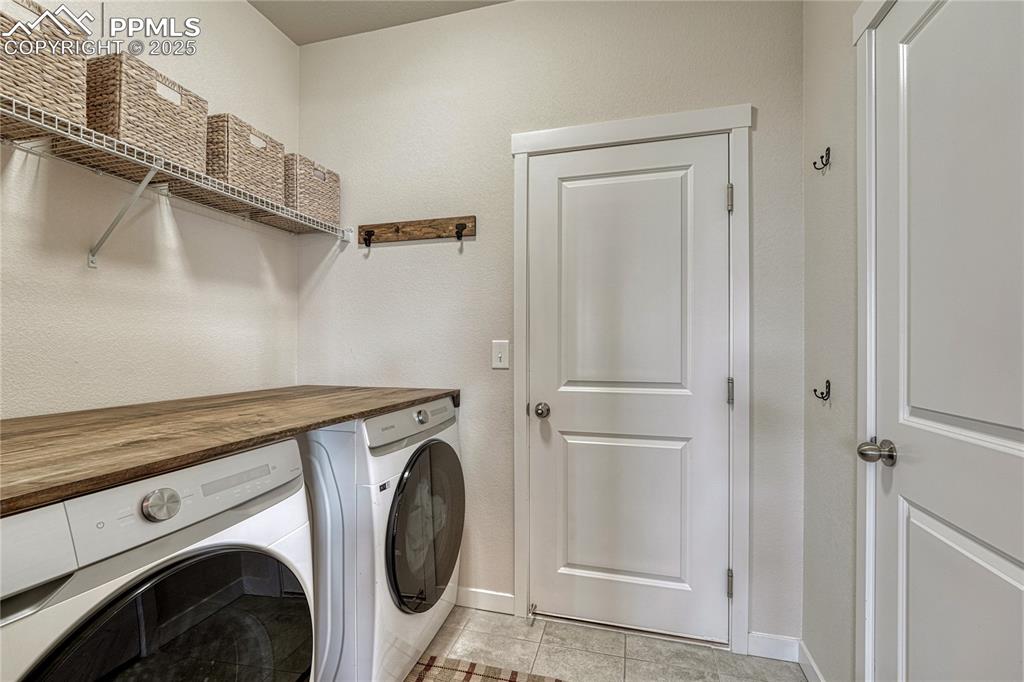Image 21 of 50: Main level laundry room