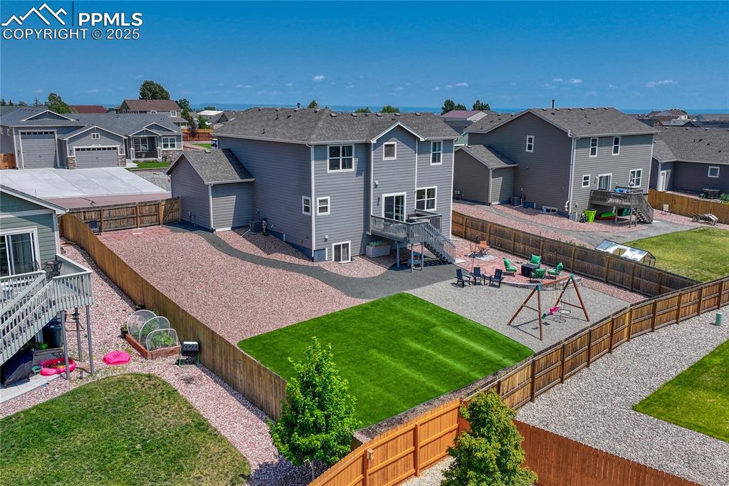 Image 48 of 50: Large side yard would work well for parking an RV