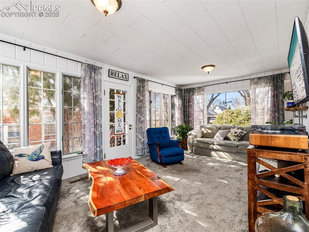 Image 23 of 50: Additional view of the Sunroom and the gorgeous windows
