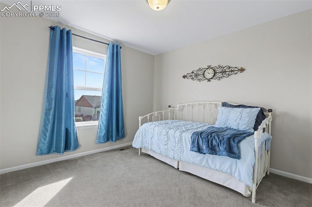 Image 21 of 50: 2nd bedroom