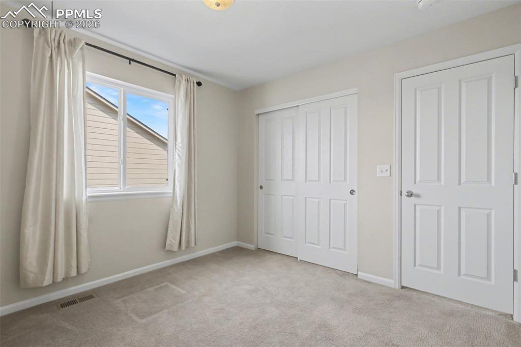 Image 30 of 50: 3rd bedroom