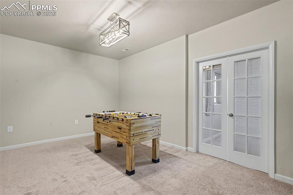 Image 32 of 50: family room in basement