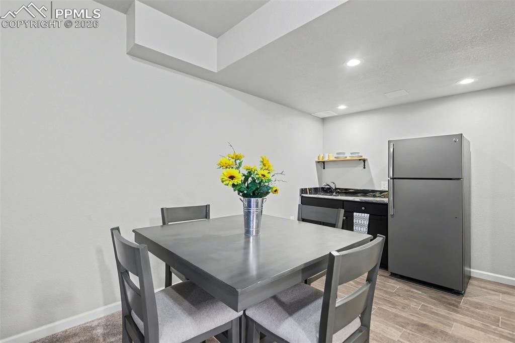 Image 33 of 50: Kitchenette in basement