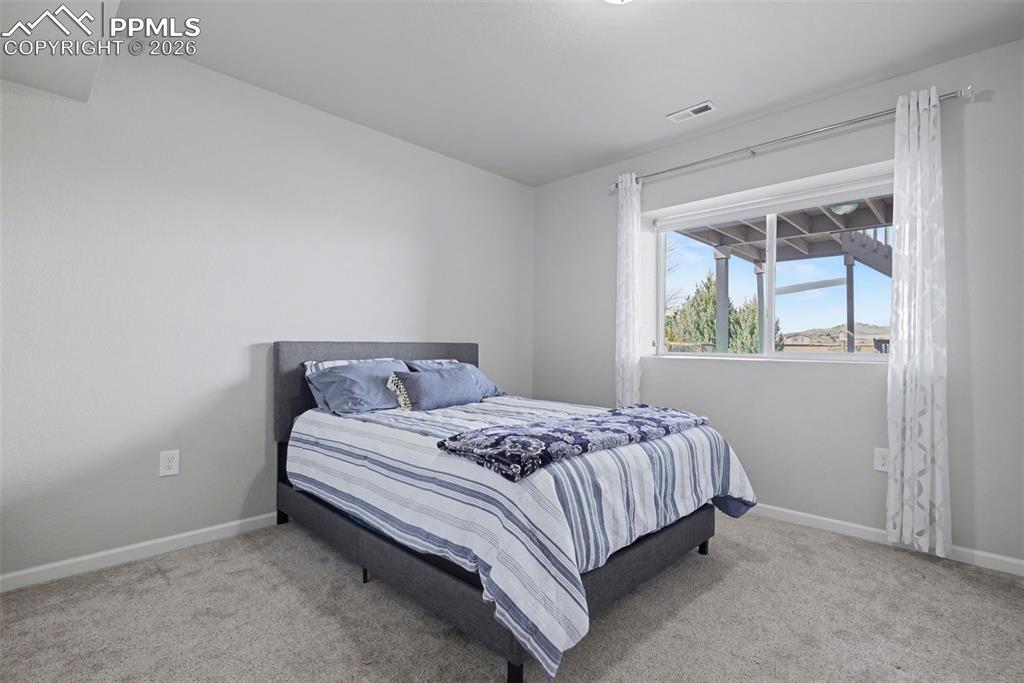 Image 40 of 50: 6th bedrrom