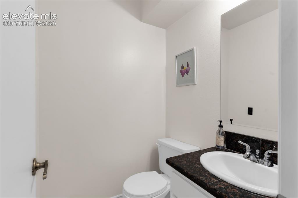 Image 20 of 37: Half bath powder room