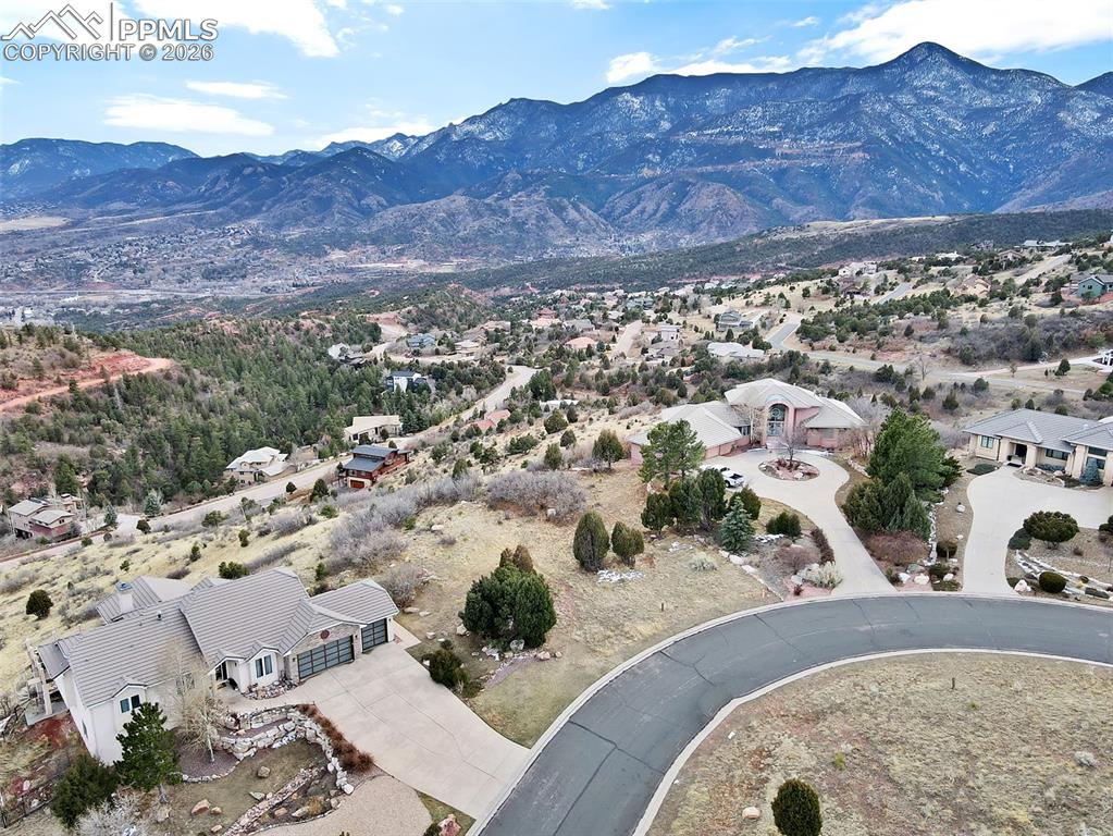 Image 2 of 16: Birds eye view of property featuring a mountain view