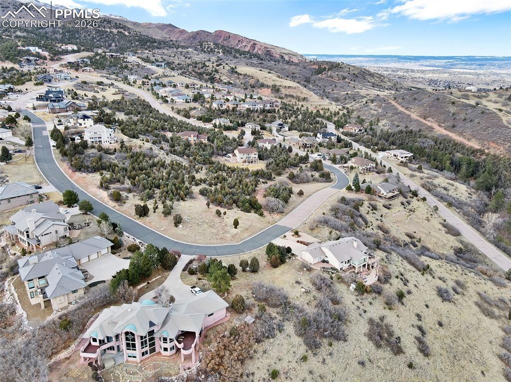 Image 6 of 16: Aerial view featuring a mountain view and a residential view