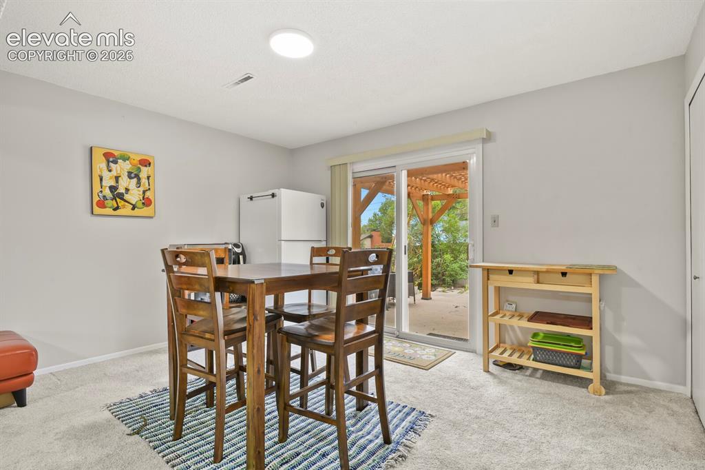 Image 28 of 39: Carpeted room with recessed lighting and a white ceiling
