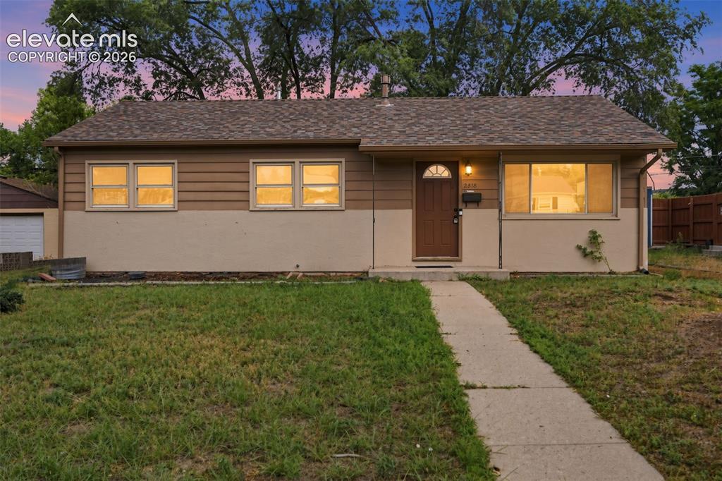 Caption: FRONT OF HOME
