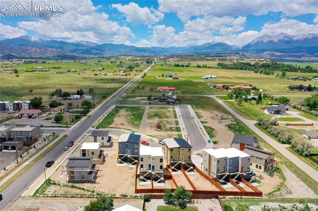 Image 19 of 24: Birds eye view of property with a mountain view