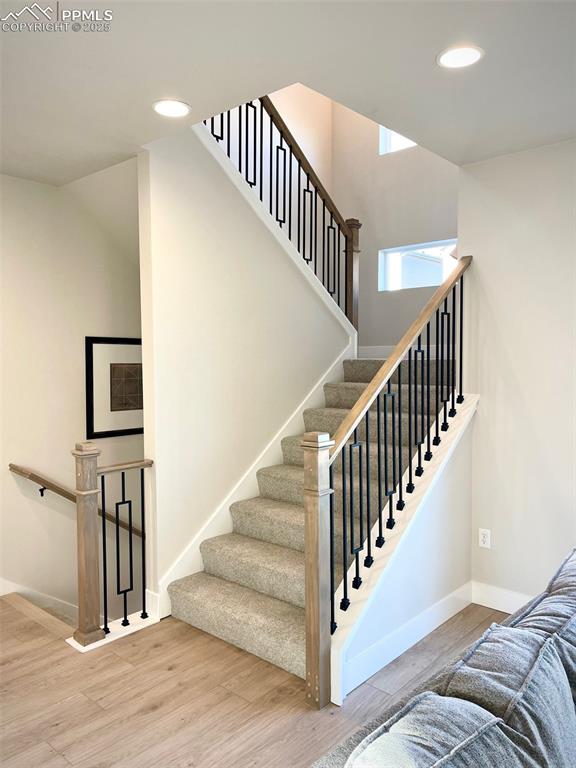 Image 33 of 34: Stairs to upper level
