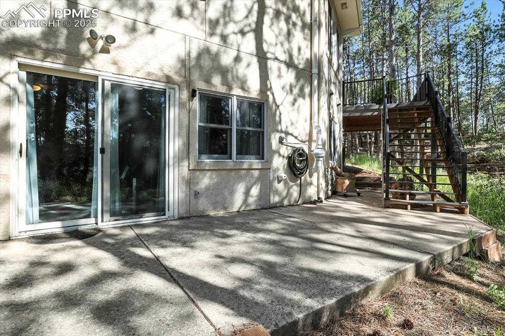 Image 40 of 45: View of patio / terrace with stairs