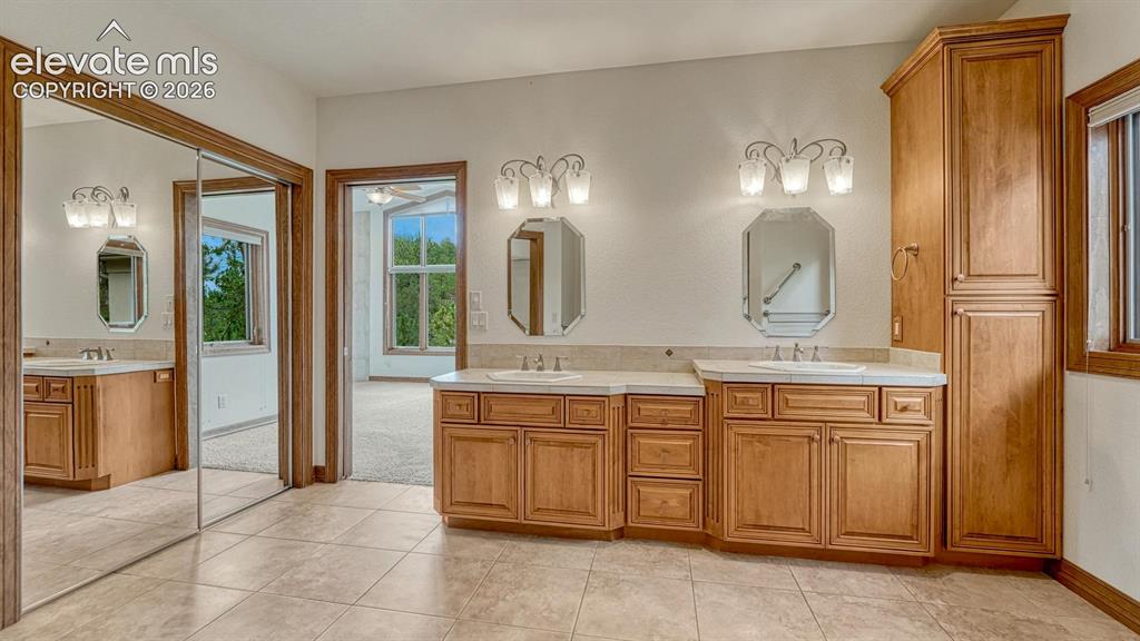 Image 13 of 50: Master Bathroom