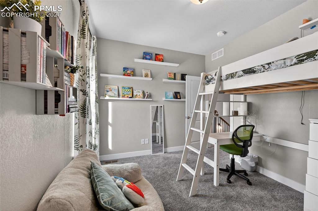 Image 22 of 38: Bedroom