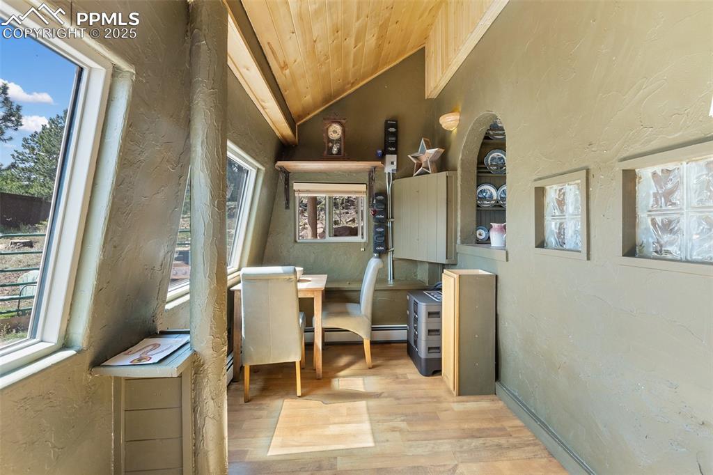 Image 24 of 50: Pass through wall from the kitchen creates an open appeal.