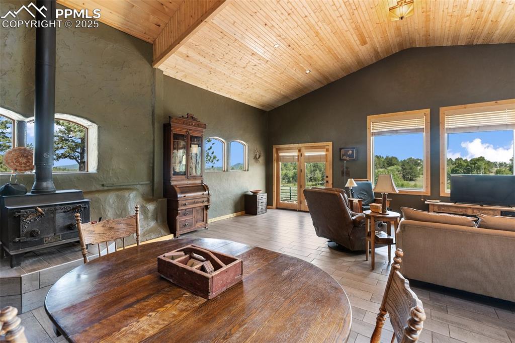 Image 28 of 50: Massive great room with an open living style encompassing the kitchen, dini