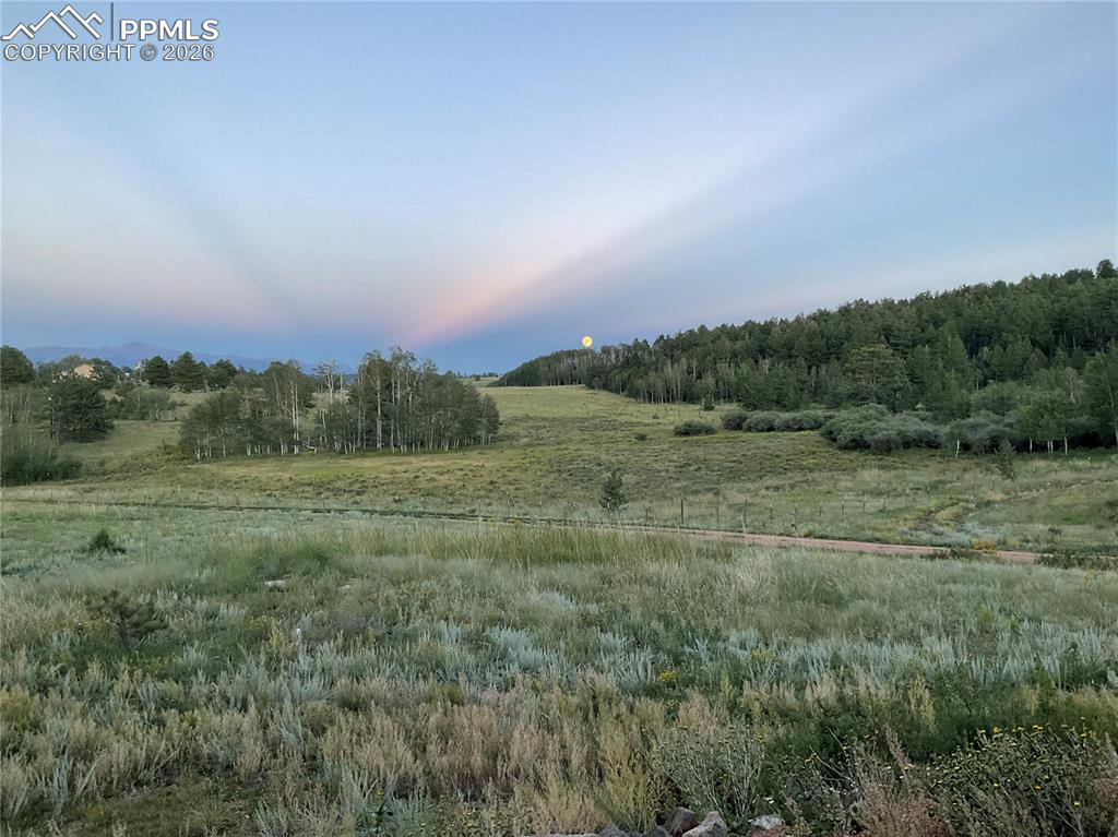 Image 33 of 34: Eastern Moonrise over Pikes Peak