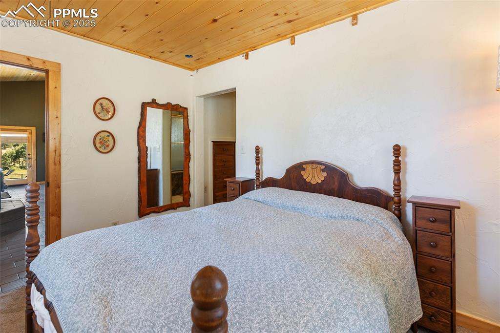 Image 34 of 50: Primary bedroom on main floor.