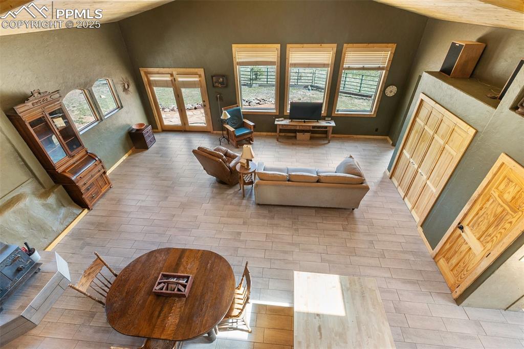 Image 36 of 50: Plenty of light. Walk out from the great room to the main yard.