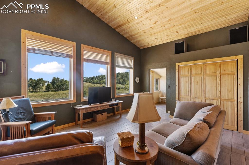 Image 6 of 34: Fantastic views to the south and east from the main living room area.