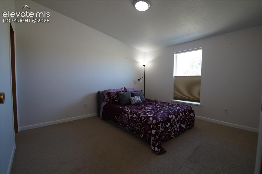 Image 18 of 49: Bedroom