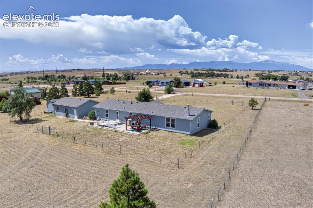 Image 4 of 48: Rear of House - Fenced & Cross-Fenced Yard