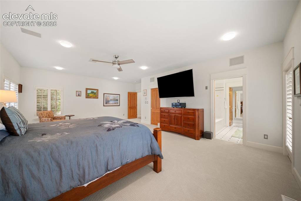 Image 24 of 50: Spacious room with recessed lighting, ceiling fan, carpeted flooring, and p