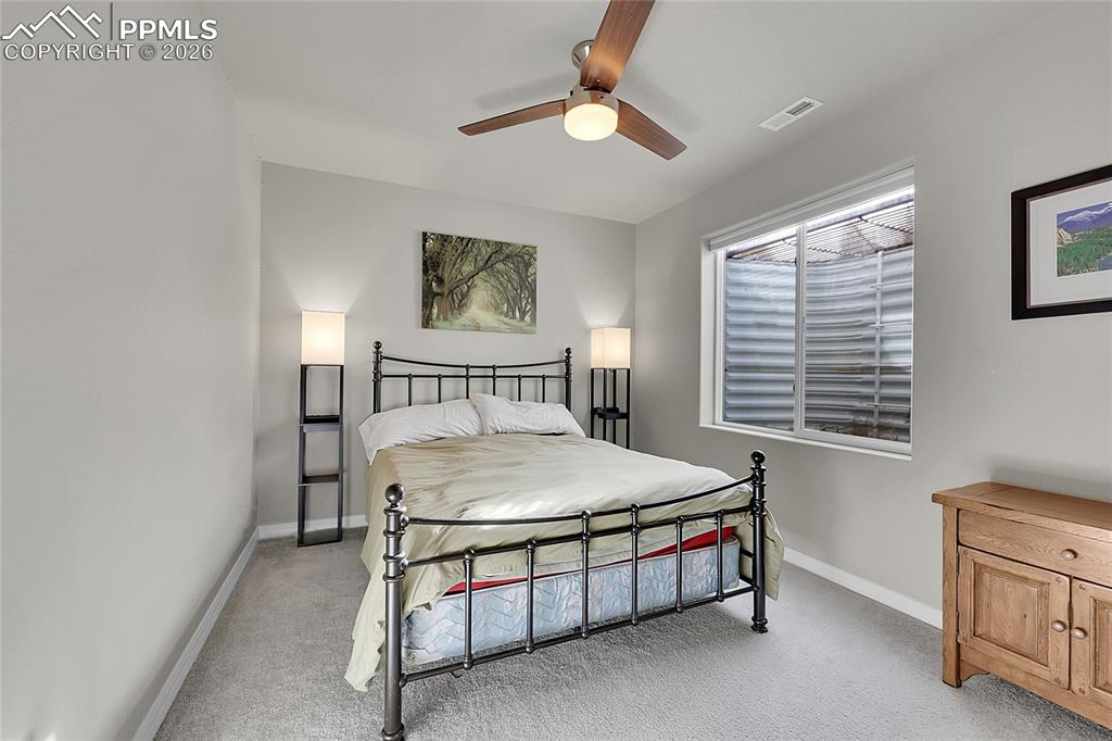 Image 29 of 42: Basement bedroom number 4