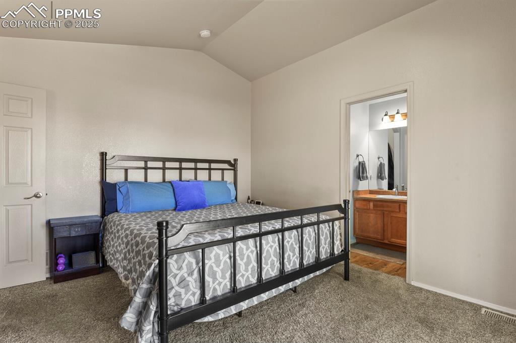 Image 12 of 21: Primary bedroom has it