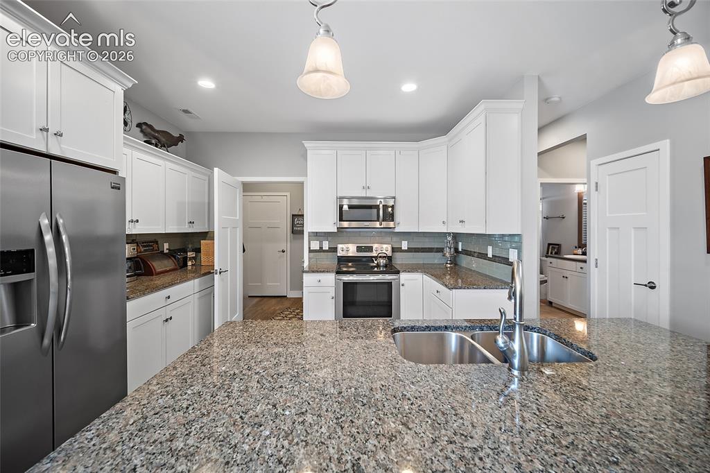 Image 10 of 25: Tall Cabinets, Stainless Steele Appliances & More