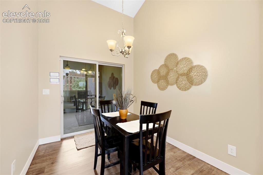 Image 18 of 42: Sliding Glass Door to Patio