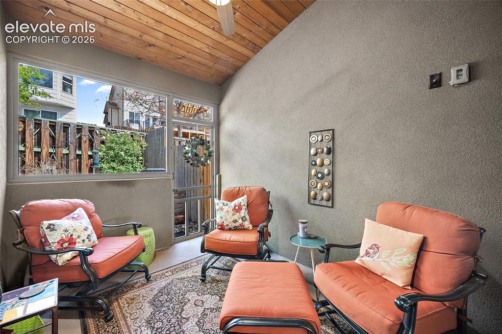Image 39 of 42: Enclosed Patio with Vaulted Wood Ceiling & Sky Light