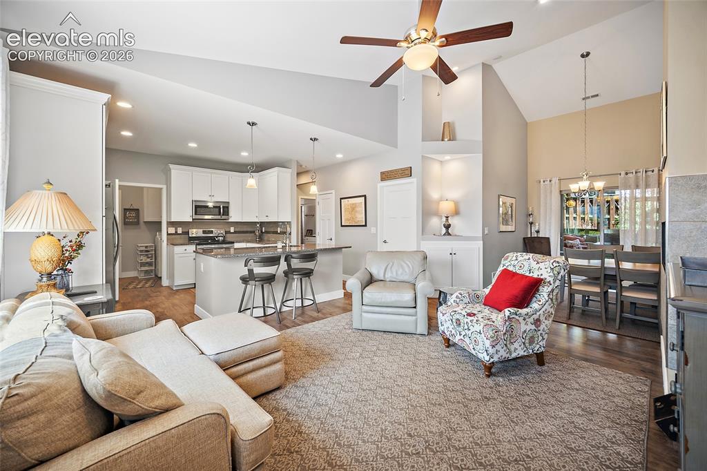 Image 4 of 25: Living Room, Dining Room & Kitchen