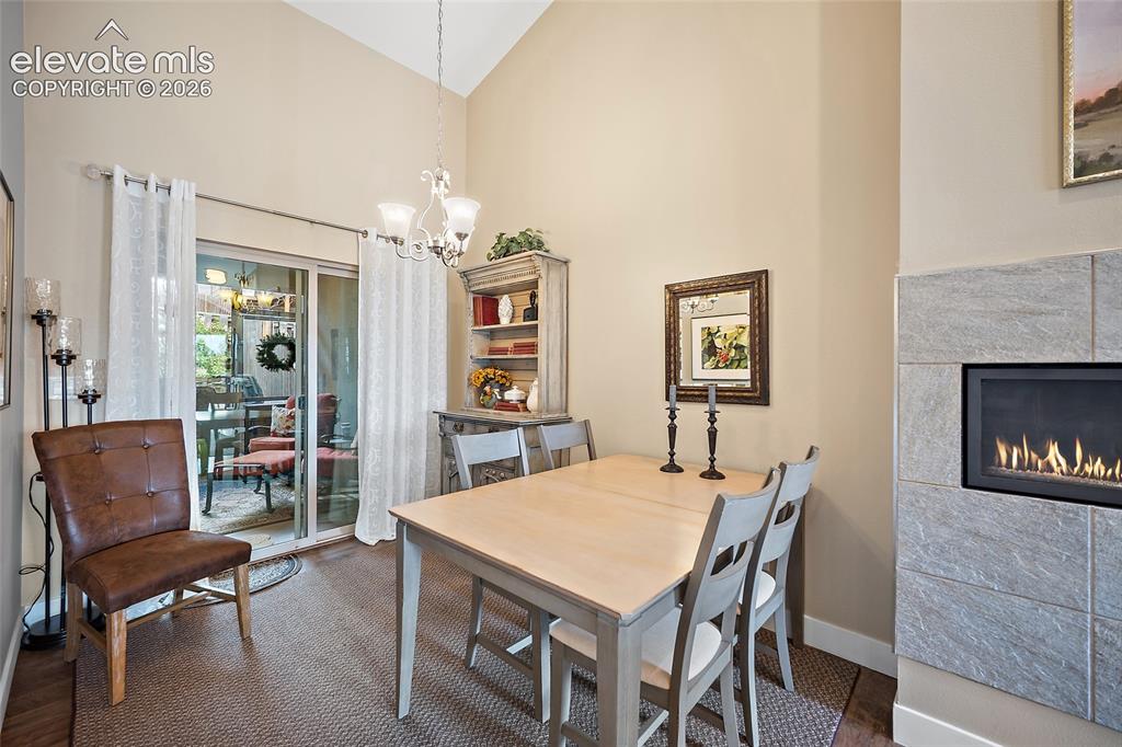 Image 7 of 25: Dining Area to Enclosed Patio