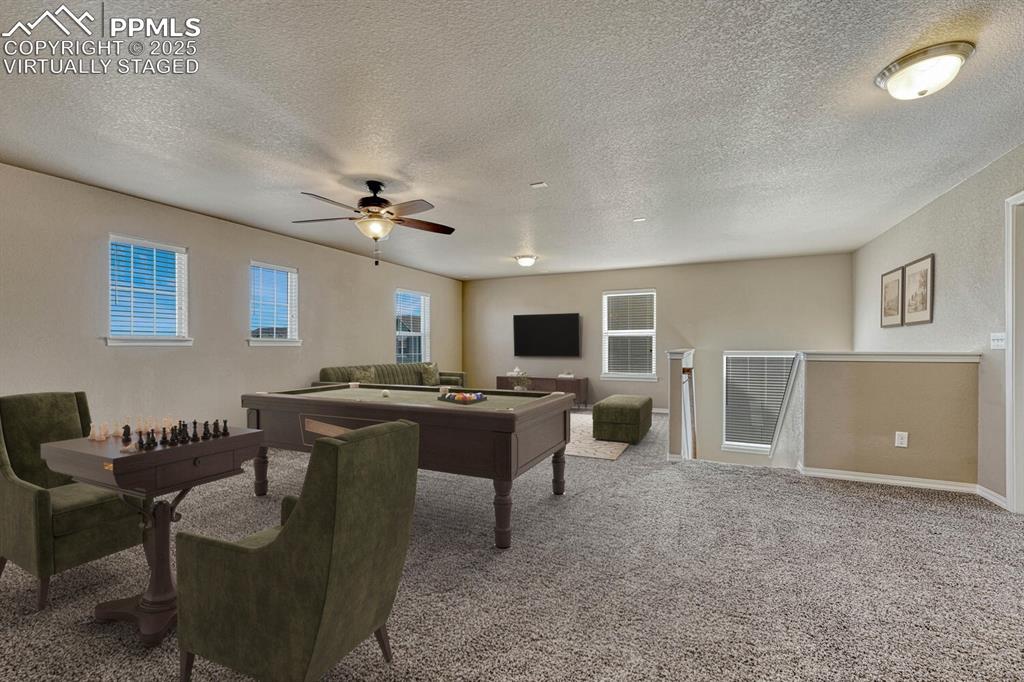 Image 13 of 50: Large upper level loft! Loft virtually staged